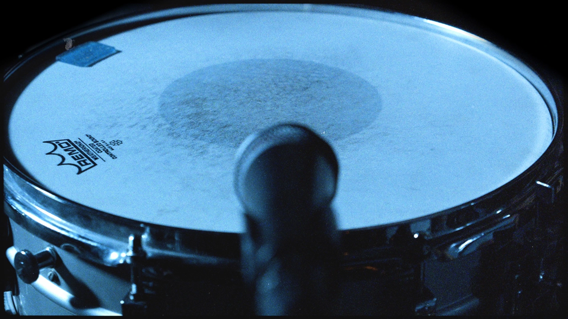 Dirt snare drum in blue light