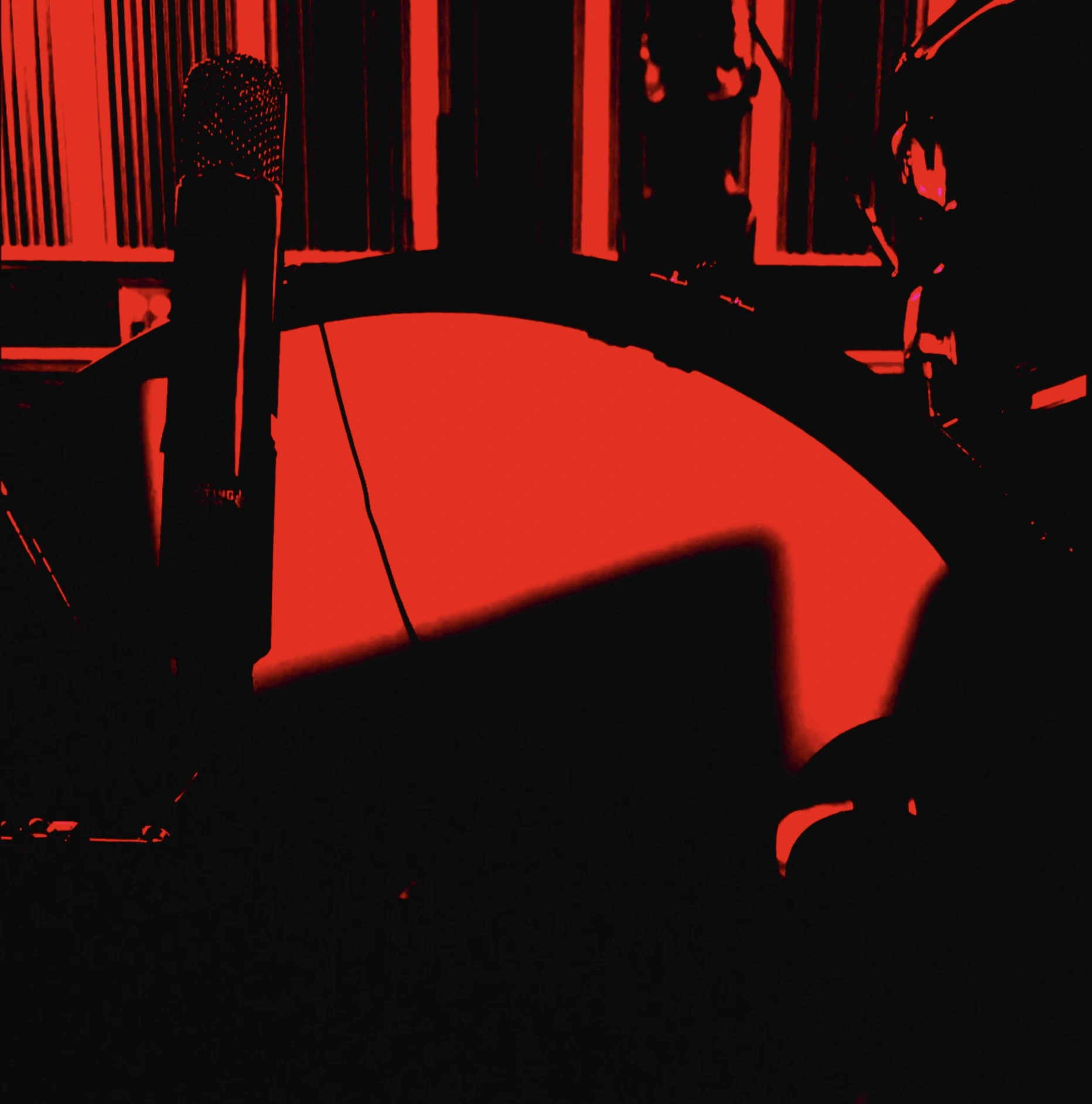 Red-lit microphone and drum in the Dirt Vol 2 session