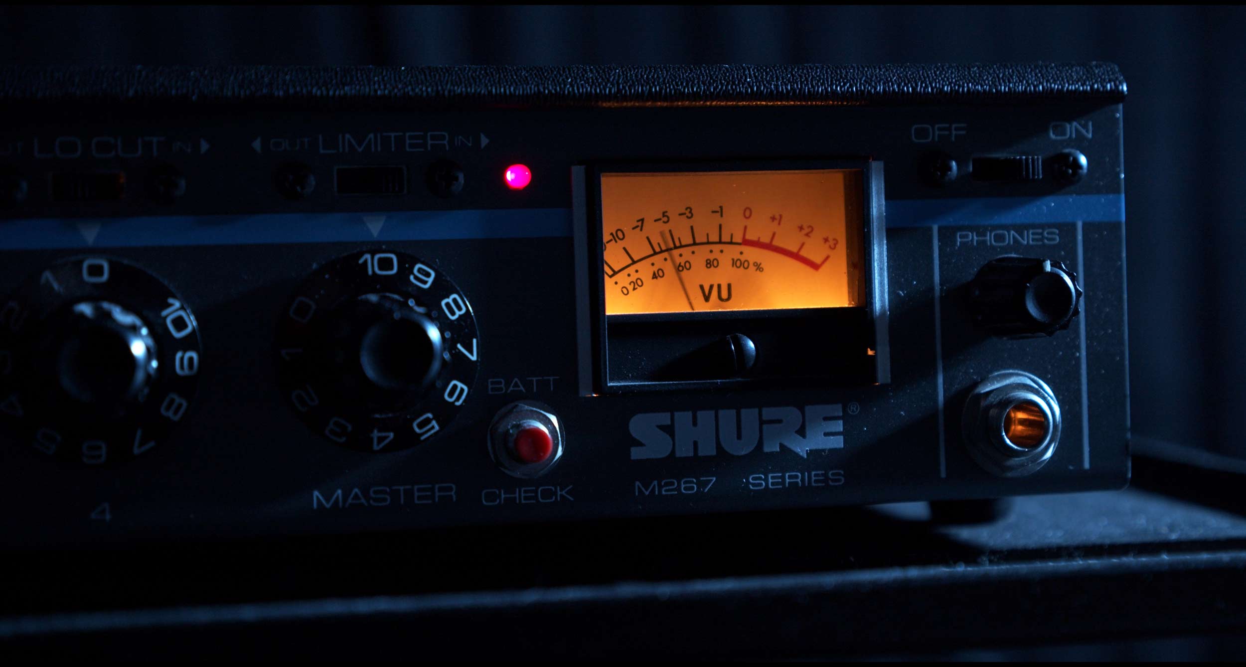 Analog mixer and glowing VU meter from the LO sessions