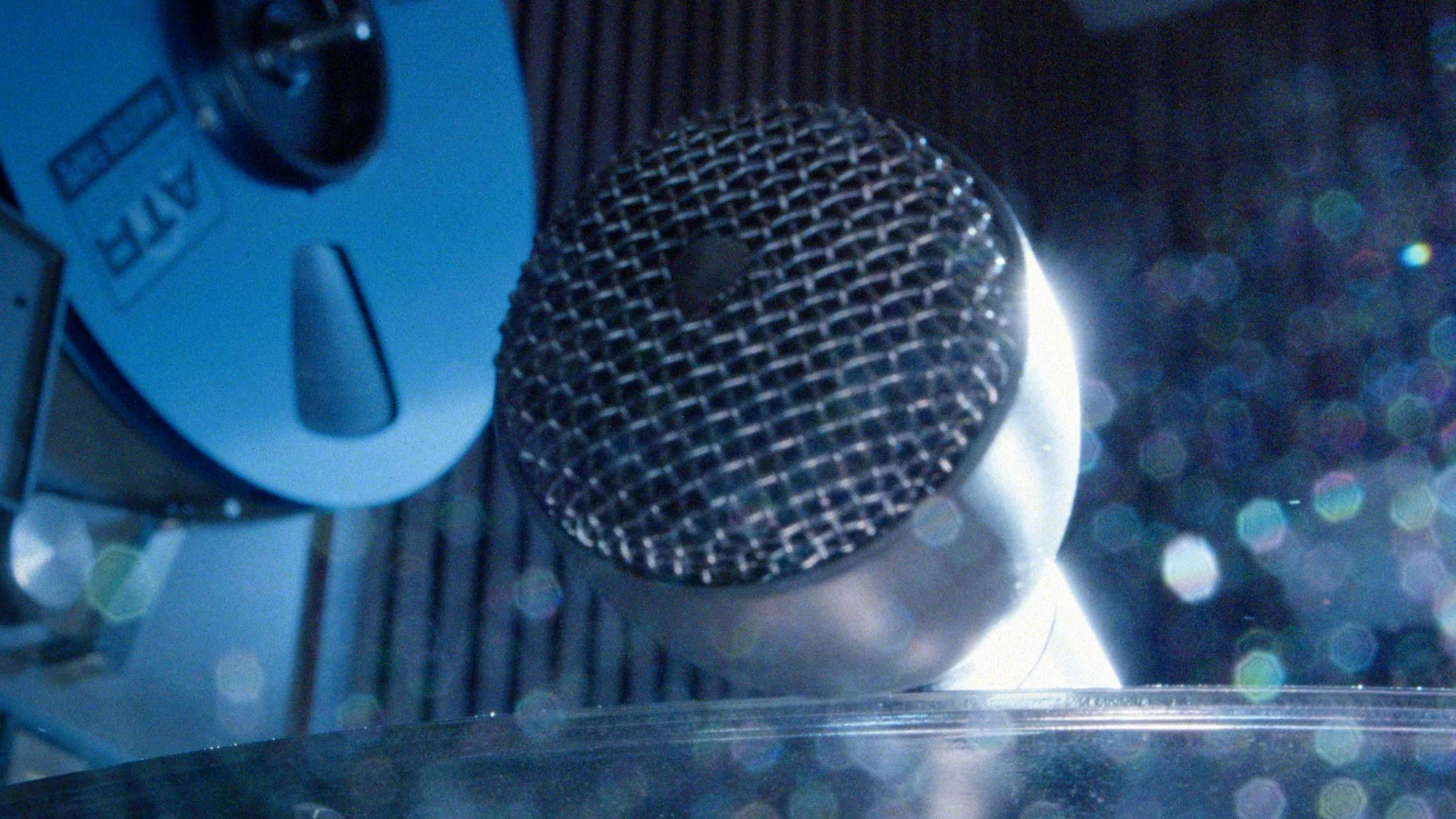 Close-up of the Vibe recording microphone and blue tape reel